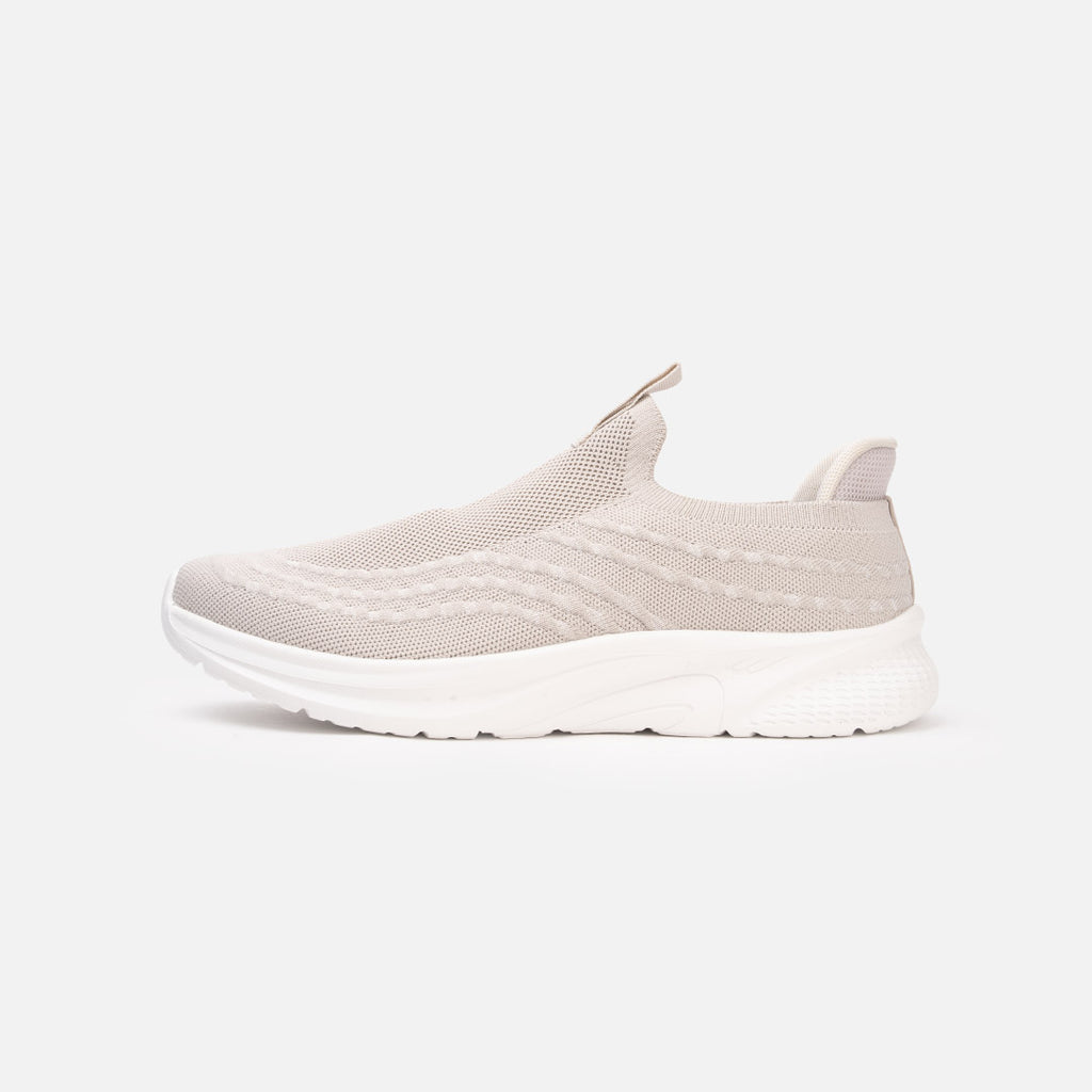 Knit upper with heel and tongue pull tabs, Springfoam midsole system with durable rubber outsole, and Bounce Pad insole system. Provides breathability, flexibility, comfort, moisture control, ventilation, and heel cushioning. Minimal to no break-in time; conforms to any foot shape. Beige and all black.